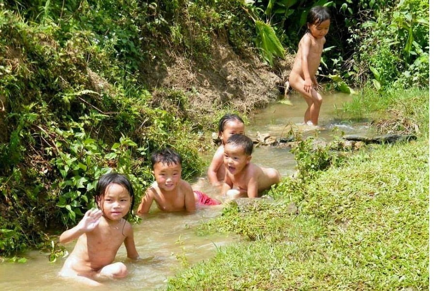 The chidren are taking a bath